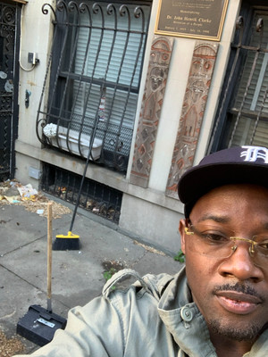 Dennis cleaning up the Dr. Clarke House on Convent Ave., Harlem